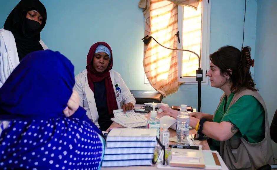 Healthcare professionals in discussion during a consultation session in Tinduf, Algeria.
